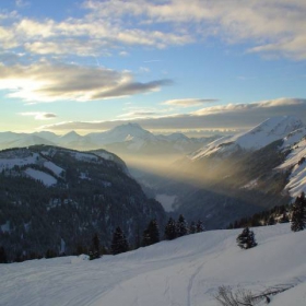 Shafts of sunlight from the setting Sun, The French Alps