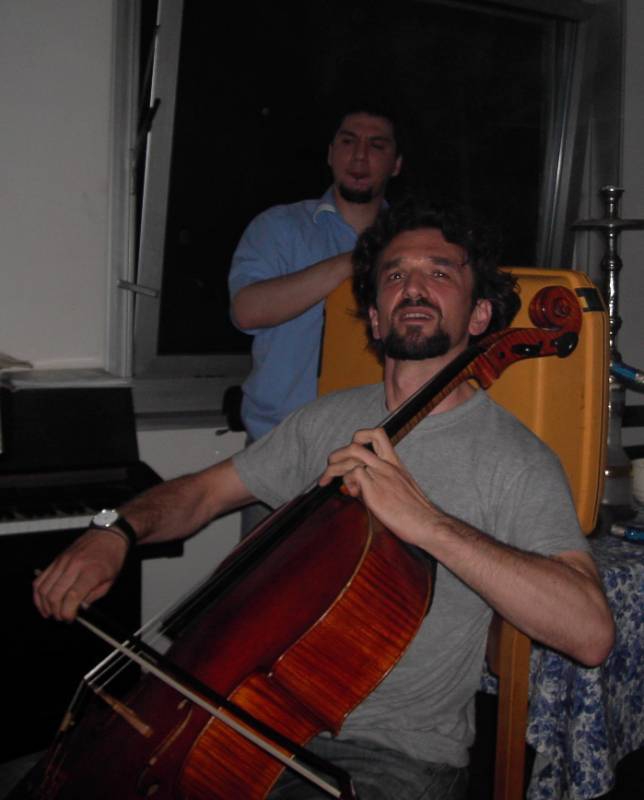 Bass playing cello?!... & unicorn playing a samsonite