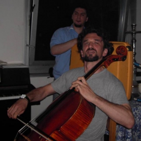 Bass playing cello?!... & unicorn playing a samsonite