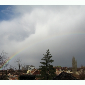 Afternoon rainbow over the city