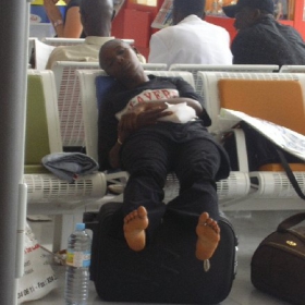 tired negro - NY airport2006