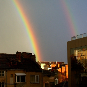 Twins rainbow above the town