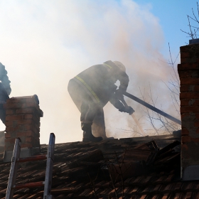 firefighters on the roof