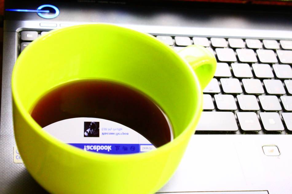 wake up in the morning with a cup of coffee and my facebook page