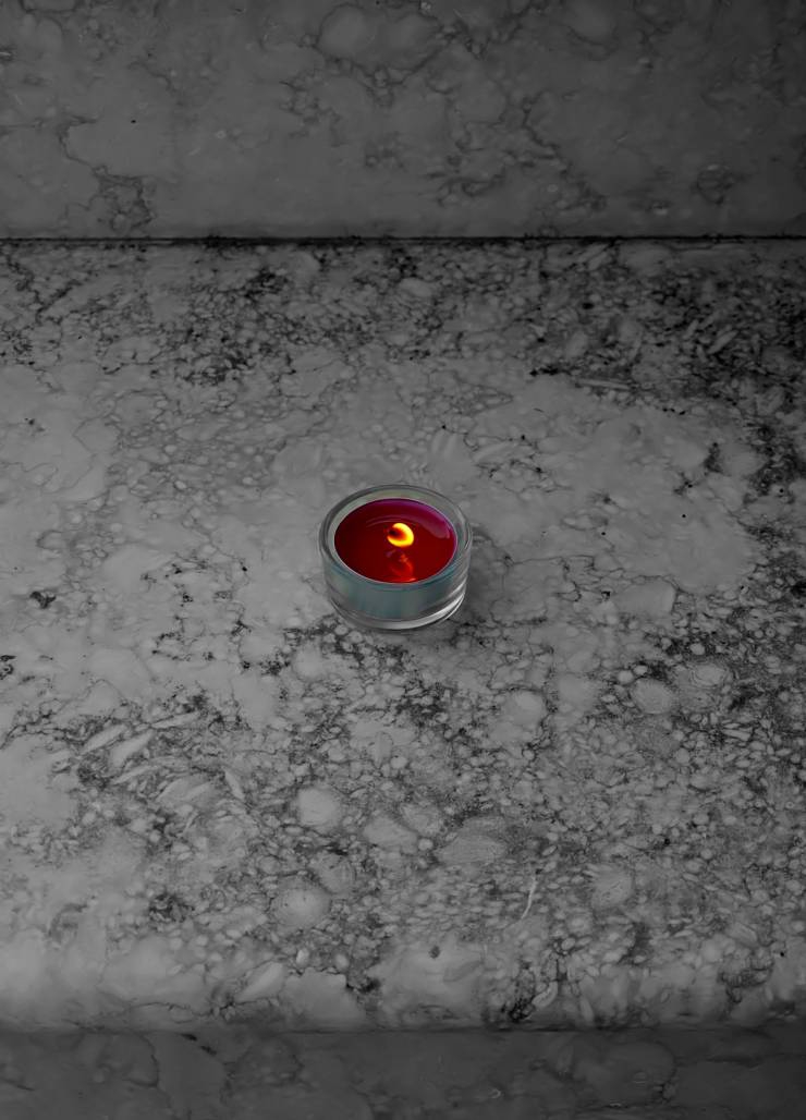 candle in the rain