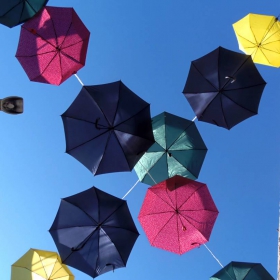 under the umbrellas