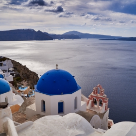 Santorini's famous blue domed tree bells church